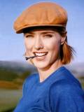 Tea Leoni con Gorra